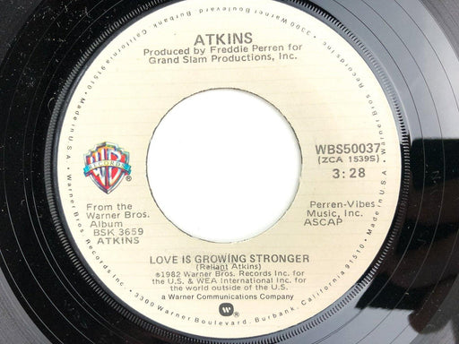 Atkins 45 RPM 7" Single Love is Growing Stronger / Feel It, Don't Fight It 1982 1