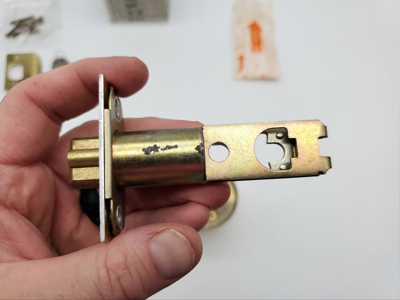 Kwikset Entry Door Knob Double Cylinder 2-3/8" Backset Bel Air Polished Brass