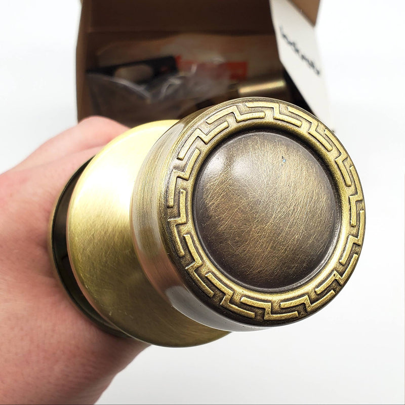 Kwikset Grecian Door Knob Passage Latch 2-3/8" Backset Antique Brass 200G