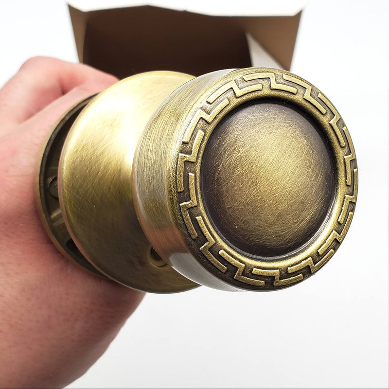 Kwikset Grecian Door Knob Passage Latch 2-3/8" Backset Antique Brass 200G