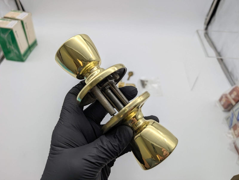 Kwikset Entry Door Knob Double Cylinder 2-3/8" Backset Bel Air Polished Brass