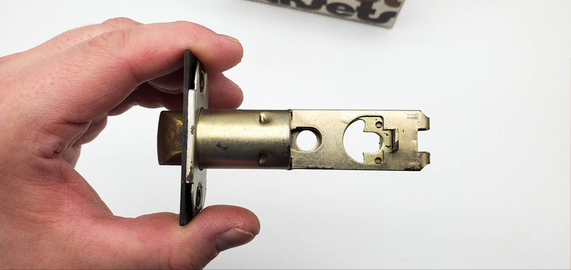 Kwikset Grecian Door Knob Passage Latch 2-3/8" Backset Antique Brass 200G