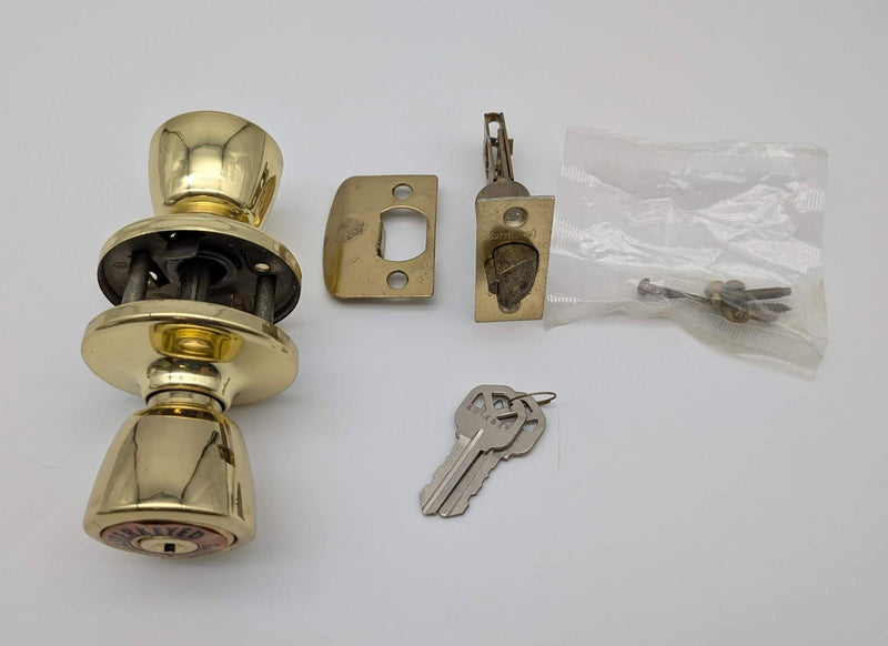 Kwikset Entry Door Knob Double Cylinder 2-3/8" Backset Bel Air Polished Brass
