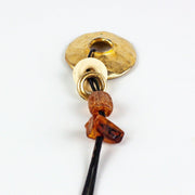 Gold Toned Statement Necklace Metal Donut Amulet Corded 4