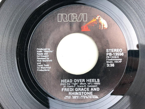 Fredi Grace and Rhinstone 45 RPM 7" Single Dog Eat Dog World / Head Over Heels 1