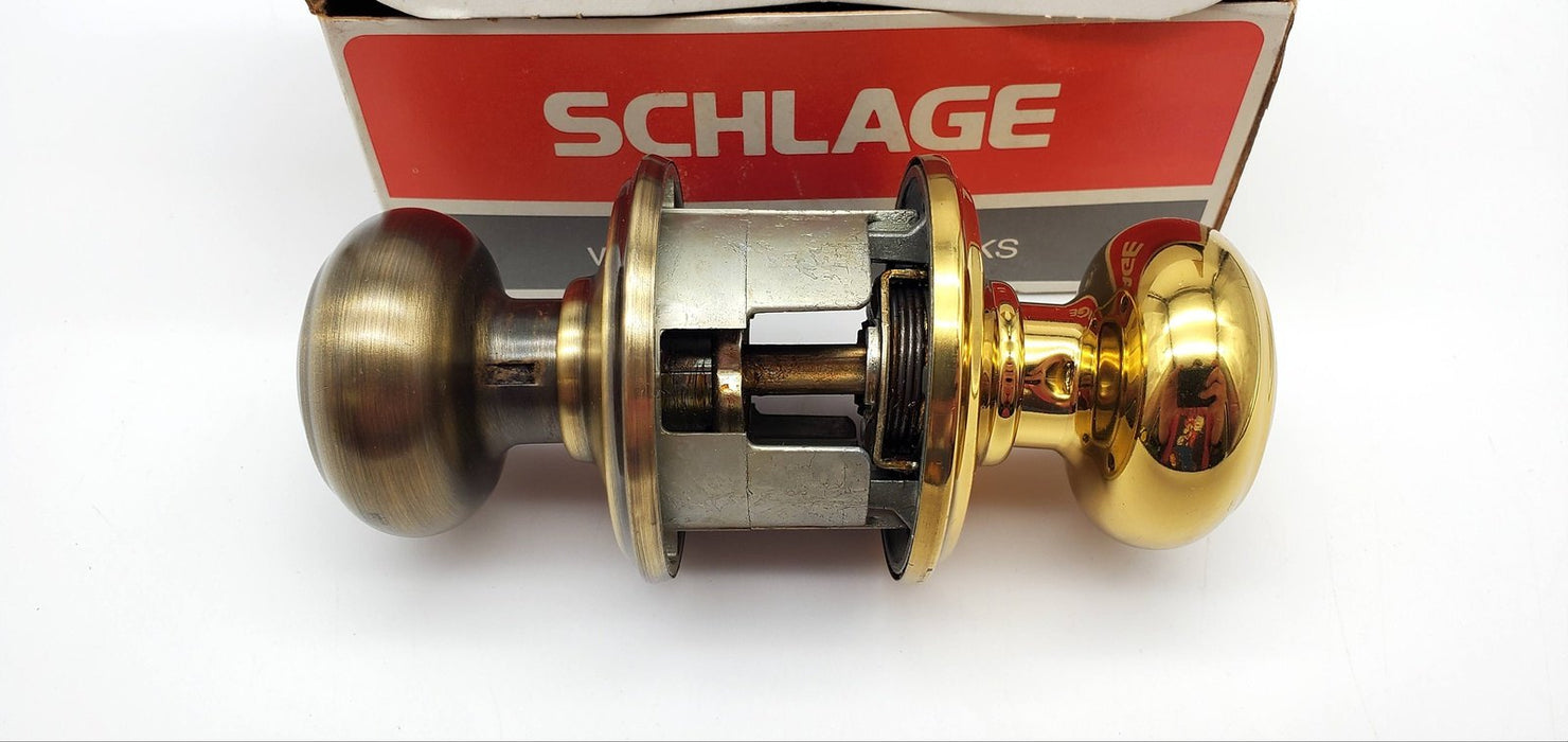 Schlage Door Knob Bright & Antique Brass Passage Latch GEO F10N NOS 3