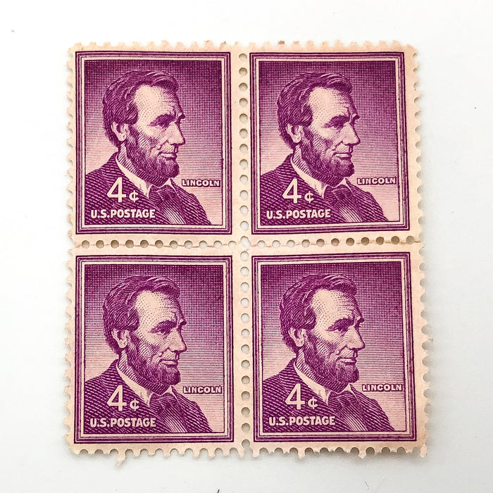 1954 Abraham Lincoln 4 Cent Stamp Block of 4 Purple Liberty Series Back Damage