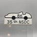 35th Annual NSDC Racing Lapel Pin Lewtan Conference 1986 Plastic White Car 1