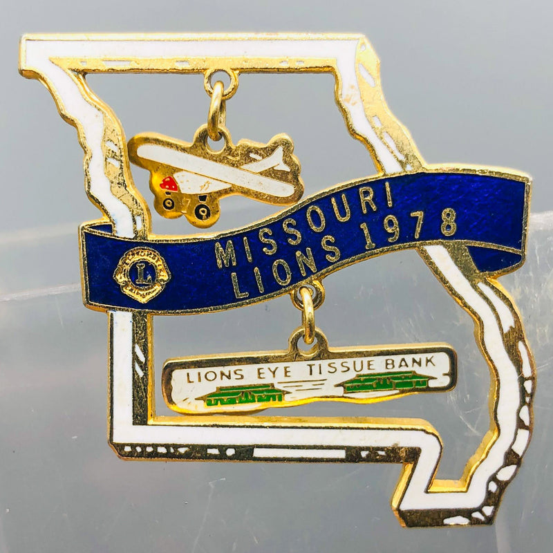 Vintage Lions Club Lapel Pin Missouri State Outline Lions Eye Tissue Bank Plane
